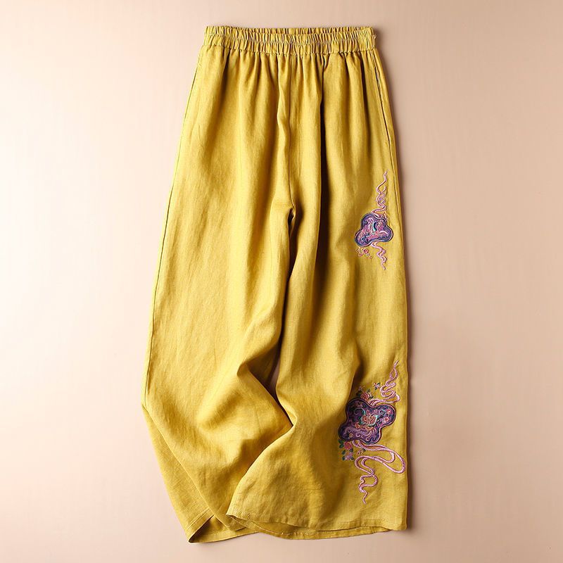 Bold and Bright: Yellow Palazzo Trousers with Exquisite Embroidery